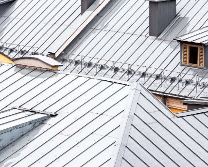 Aerial view of silver metal roofs